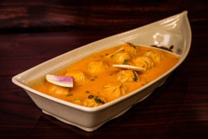 Jhol Momo in a Titanic shaped bowl.