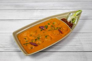 Jhol Momo in a Titanic shaped bowl.