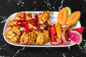 Tandoori Chicken Kabab on a white plate